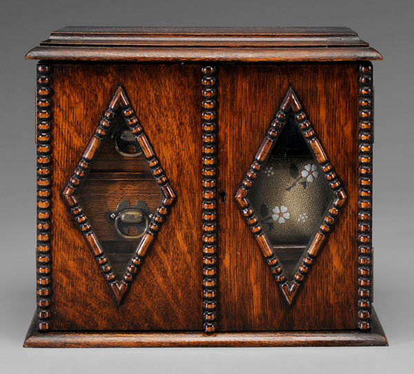 Gentleman's Oak Smoking Cabinet: British, early 20th century, lift top above three drawers with mahogany secondary, pipe rack and humidor, 11 x 12-1/2 x 7-1/2 in., excellent condition