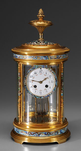Tiffany Champlevé Shelf Clock: French/American, late 19th century, round with brass and champlevé frame, porcelain face with floral festoons and marked "France", brass works marked "Tiffany & Compy", time and strike, matching merc