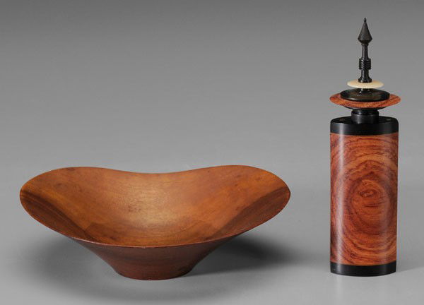 Rude Osolnik: (American, 1915-2001), free-form olive wood bowl, vessel: bowl marked on base "Osolnik Originals olive wood/Linda", 1-7/8 x 6-1/2 in., [minor stains, otherwise good condition;] with modern capped vess