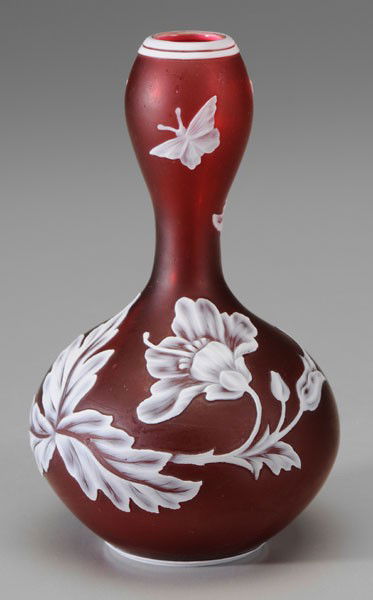 Webb Cameo Glass Vase: English, late 19th/early 20th century, flowers, leaves and butterflies on red ground, circular mark on base "Thomas Webb & Sons Cameo" with "GEM" in center, 6 in., excellent condition Private Collecti