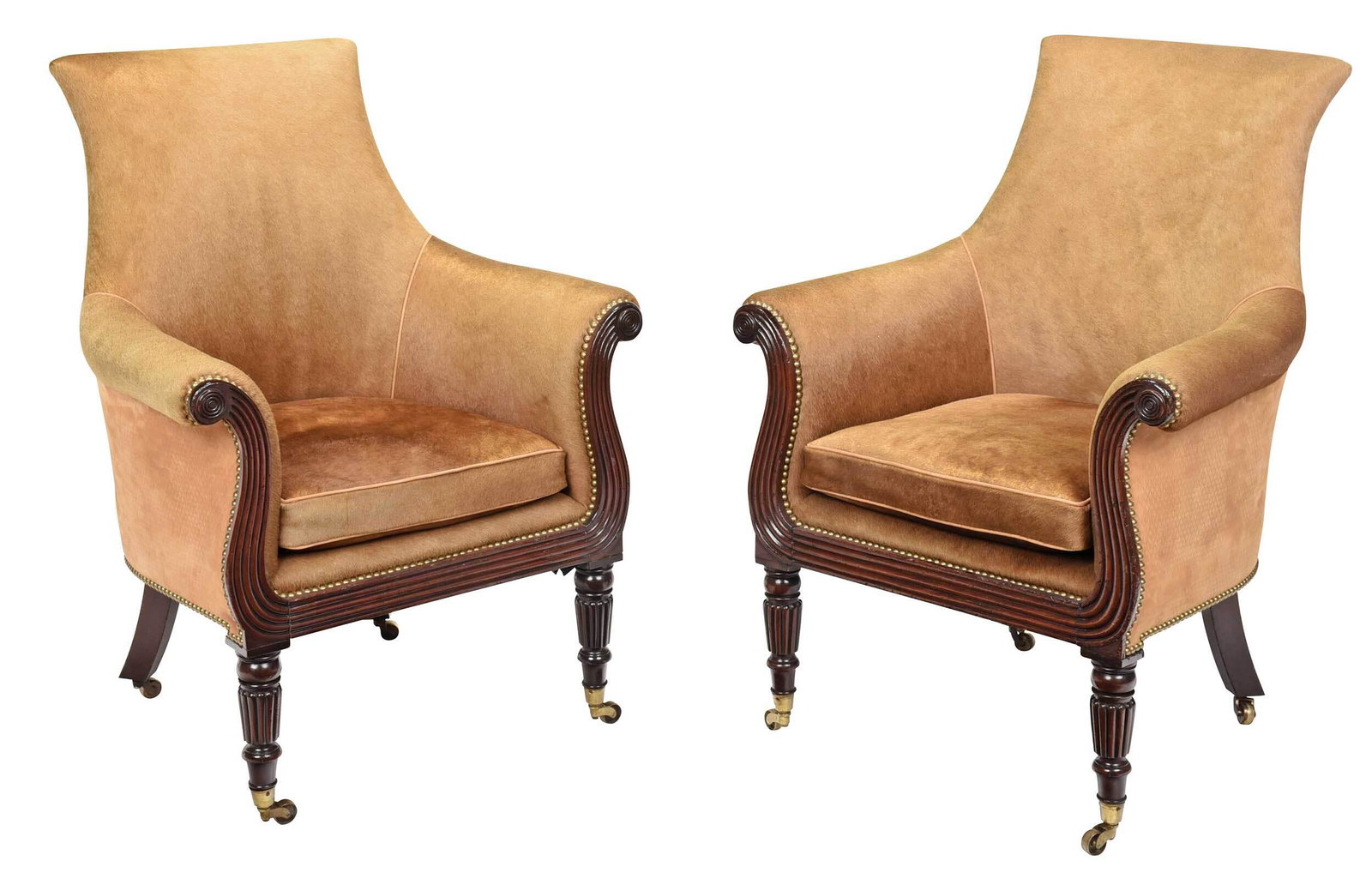 Pair George IV/Style Mahogany Library Chairs: British, one circa 1825, one modern made to match, each with animal hide style upholstery, shaped backs with scrolled arms, brown microsuede back panels, brass tacking, mahogany legs with brass caster