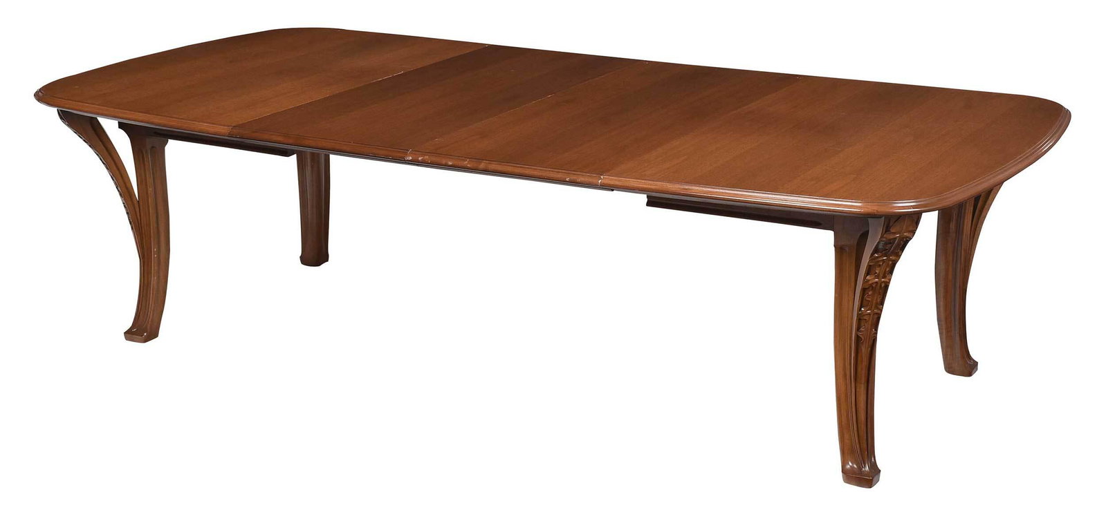 Louis Majorelle Art Nouveau 'Chicoree' Dining Table: French, circa 1900, unsigned, walnut extension dining table with molded top over molded and leaf carved buttressed legs, four leaves, 28 x 50 x 61 in., opens to 141 in. Provenance: Christie's New York
