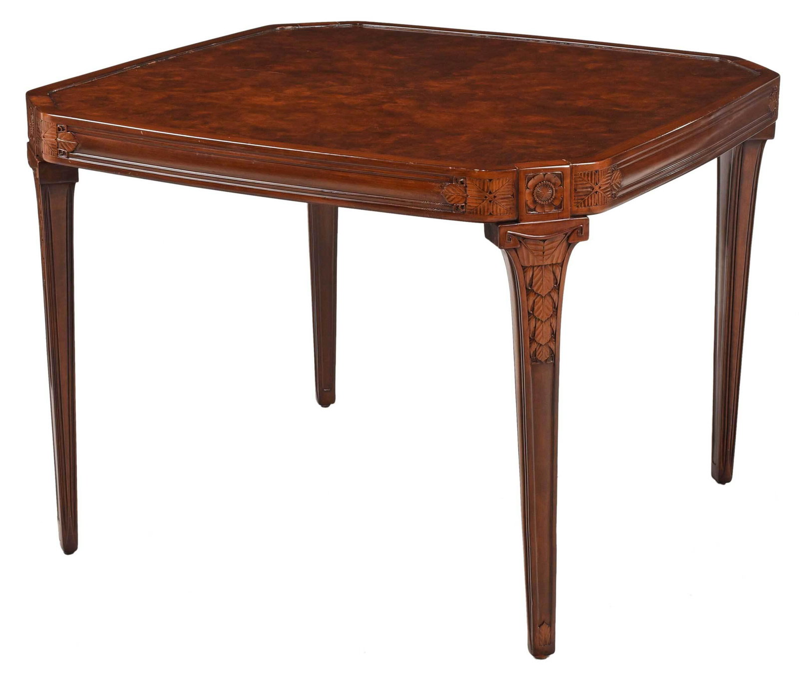 Leon Jallot Attributed Carved Pearwood Games Table: French, early 20th century, unsigned, bookmatched top with stylized leaf and floral carved skirt on carved and tapered legs, veneered top with painted embellishments, 29-3/4 x 39-3/4 x 39-3/4 in. Prov