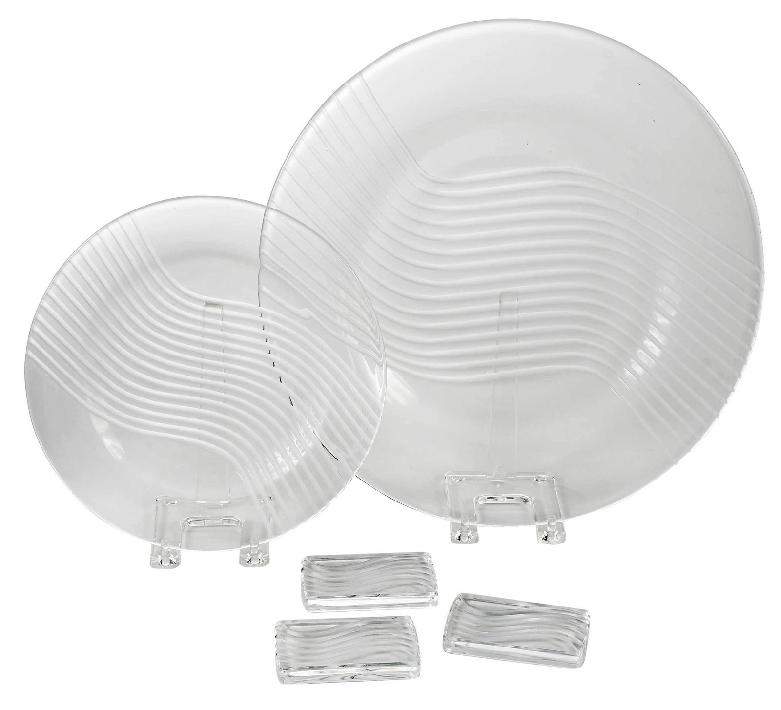 25 Piece Lalique Glass "Leda" Dinner Service: France, 20th century, comprising: eight oversized dinner plates, nine salad plates, and eight knife rests, each cut with a series of serpentine lines, with etched "Lalique R. France" signature, larges