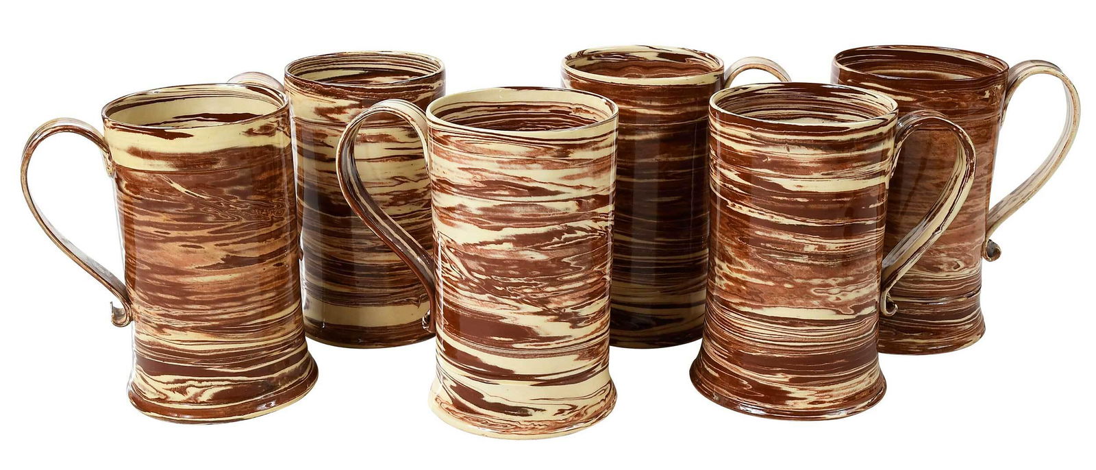 Michelle Erikson: (Hampton, Virginia, 20th/21st century) set of six reproduction swirl ware tankards, each with strap handle, marked "ME" on base, 7-7/8 x 6-7/8 in. Provenance: The Important Private Collection of a Roc