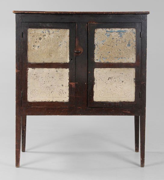 Fine Southern Yellow Pine Pie Safe: attributed to Randolph County, North Carolina, 19th century, yellow pine throughout with rich original surface, two doors with double punched tins, tins and side panels with early cream paint over ori