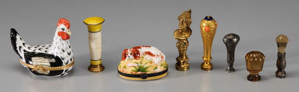 Two Porcelain Dresser Boxes, Six: Assorted Seals, one dresser box shaped as rooster, marked "Tiffany & Company, Limoges", 4-1/4 in., [minor surface losses;] one with sleeping spaniel and bone, marked "Limoges", 2-1/4 in., [good condit