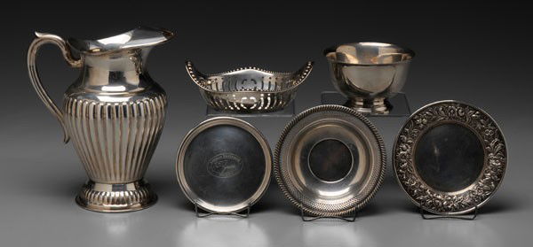 Six Pieces Silver Hollowware: Tiffany sterling Revere style bowl; Repoussé sterling plate; openwork sterling dish and bowl; sterling coaster, "Lehman Brothers"; water pitcher marked "900", 54.68 oz.T.; detailed listing available