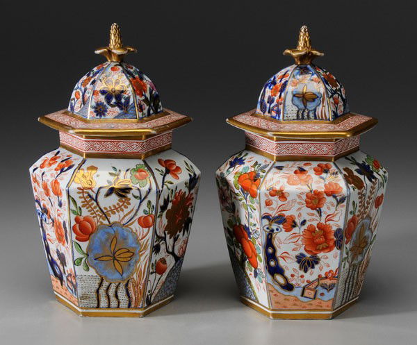 Pair Pearlware Lidded Jars: British, 19th century, in the Imari palette with exotic birds, probably Spode or Worcester, 10 in., both with repaired base rims Provenance: Private Collection, Madison, Georgia
