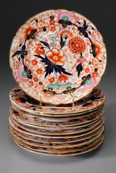 Set of Twelve Ironstone Plates: British, early 19th century, boldly decorated in the Imari palette, unmarked, probably Coalport, 9-1/2 in., good condition, several with scattered light discoloration, one with 2 in. rim crack, minor 
