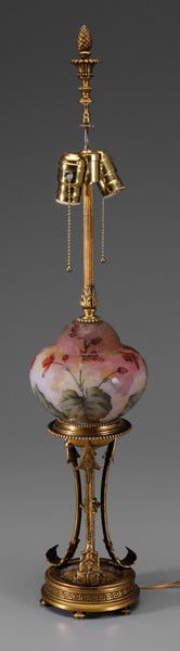 Daum Nancy Gilt Bronze-Mounted Lamp: French, early 20th century, fine cameo art glass font marked "Daum Nancy France" with flowers and leaves in relief on mottled ground, gilt bronze base with arrows and scrolls on circular Greek key pla