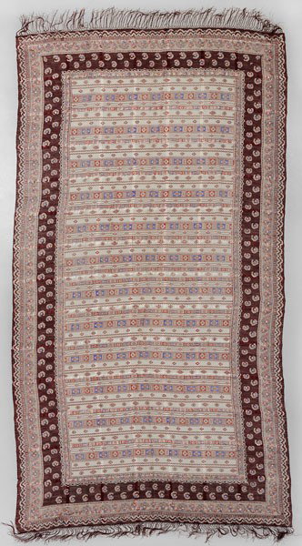 Indian Shawl: 19th century, printed rows of floral and geometric motifs on finely woven cotton embellished with silk bands, knotted silk fringe, 68 x 144 in. including fringe; accompanied by box inscribed in ink "E