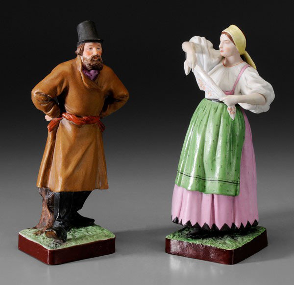 Pair Gardner Porcelain Figures: Russian, late 19th/early 20th century: striding man with beard and top hat, woman with babushka and pink skirt, red-printed marks for Gardner, each about 9-1/2 in., excellent condition