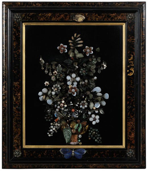 Lapidary Bouquet in Tortoiseshell: Frame, Continental, probably mid-19th century, an arrangement of various stones bezel-set, prong-set and strung on wires, attached to a black lacquered board set in a frame with tortoiseshell veneer,