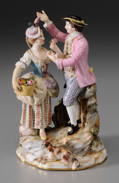 Meissen Figural Group: German, 19th century, man and woman with flowers, dog at their feet, blue crossed swords mark under glaze, 6-1/4 in., excellent condition Provenance: Private Collection, Raleigh, North Carolina