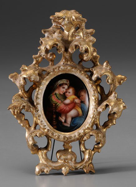 After Raphael: (Italian, 1485-1520), Madonna della Sedia, unsigned, hand-painted and stenciled porcelain plaque, 2-1/4 x 1-7/8 in.; original carved and gilt wood frame, abrasions, not examined out of frame; frame wi