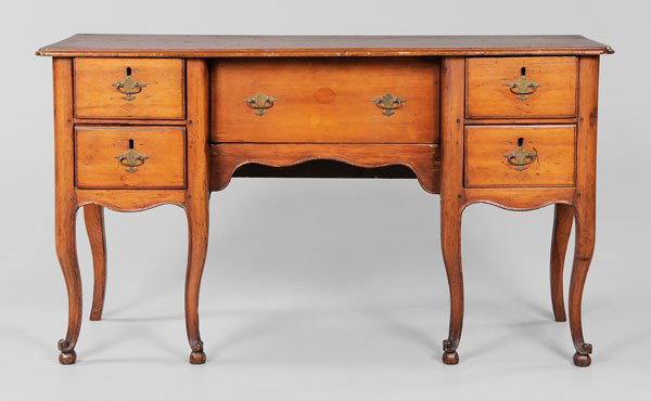 Provincial Louis XV Style Vanity: British or French, 19th century, pine throughout, dovetailed drawers and cabriole legs, tenoned and pinned construction, 27 x 47 x 16 in., refinished with traces of paint, central drawer restored (nai
