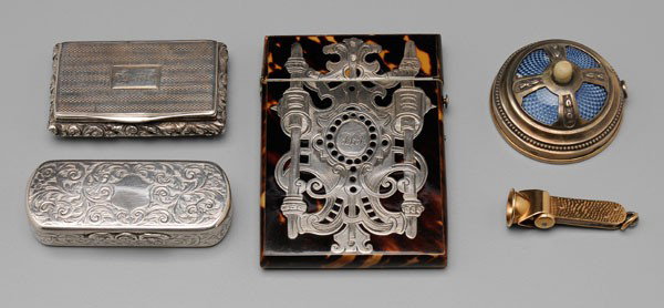 Five Desk Accessories: tortoise card case with applied silver; French silver and enamel table bell; 15 kt. yellow gold cigar cutter; detailed list available