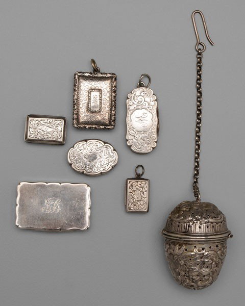 Silver Vinaigrettes and Tea Ball: six English silver vinaigrettes, rectangular and oval, various makers and dates, .925 fine; German silver tea ball, .800 fine, 4.03 oz.T., (seven pieces); detailed list available