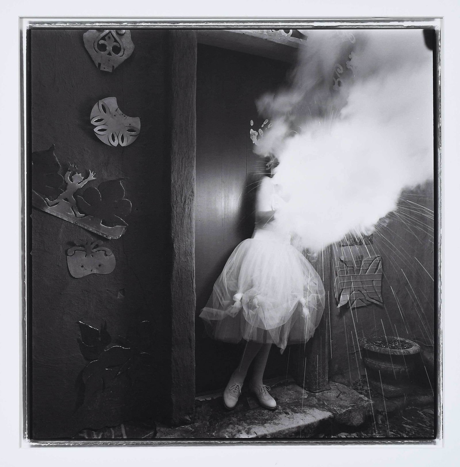 Keith Carter: (American, b. 1948) Meagan's New Shoes, 1993, edition of 14/50, signed, toned gelatin silver print, sight 15-1/4 x 15 in.; matted, 28 x 22 in. Provenance: Vintage Works, Ltd., Chalfont, Pennsylvania,