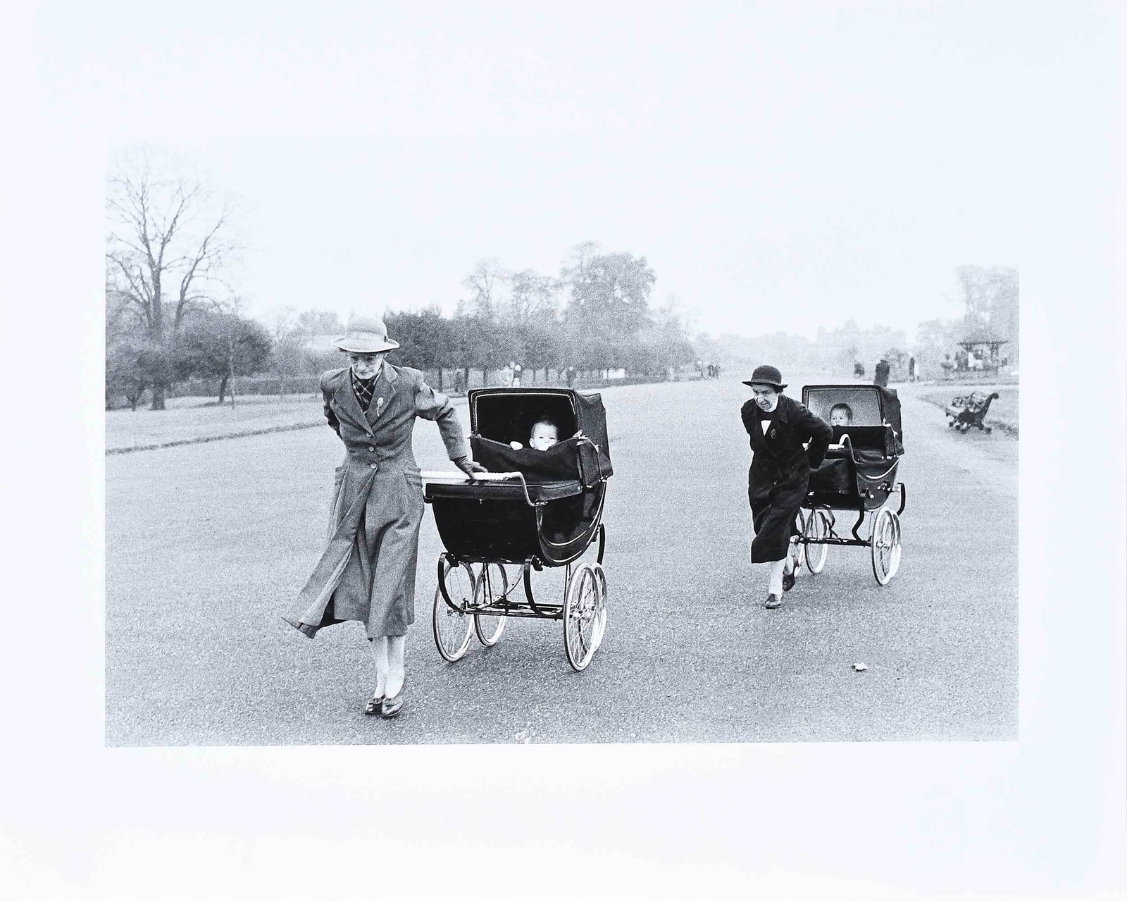 Bruce Davidson: (American, b. 1933) England (nannies pulling prams), signed print verso, gelatin silver print, 16 x 20 in.; unmatted, unframed Provenance: Private Collection, Wisconsin