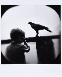 Keith Carter: (American, b. 1948) Boy and Hawk, 2005, signed, titled, dated and editioned 18/35 pencil verso, toned gelatin silver print, sheet 20 x 16 in.; unframed Provenance: Catherine Edelman Gallery, Chicago,