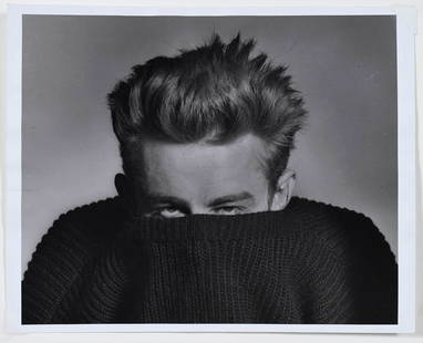 Phil Stern: (American, 1919-2014) James Dean (pullover sweater), 1955, signed, dated, titled, and stamped print verso, gelatin silver print, 11 x 14 in.; matted not framed, 16 x 20 in. overall Provenance: Faney/K