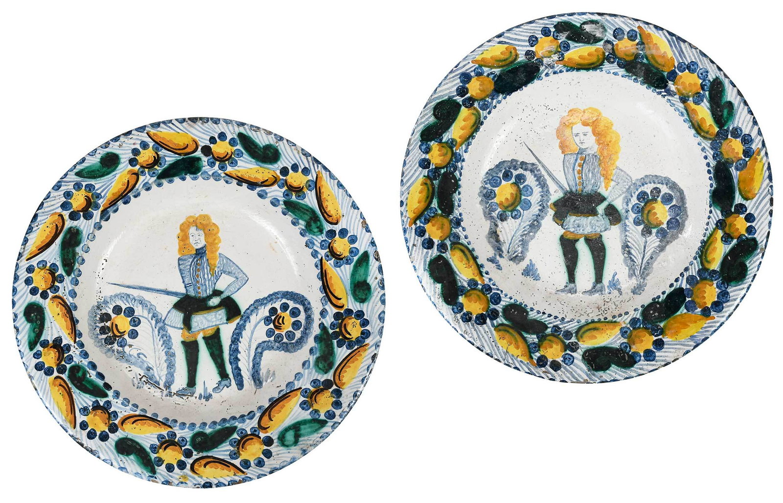 Pair of Delftware Portrait Plates: 17th/18th century, two ceramic plates with polychrome floral design, each featuring a portrait of a gentleman with sword in the center, 1-3/4 x 15-1/4 in. Provenance: Estate of Ben Smith, Newnan, Geor