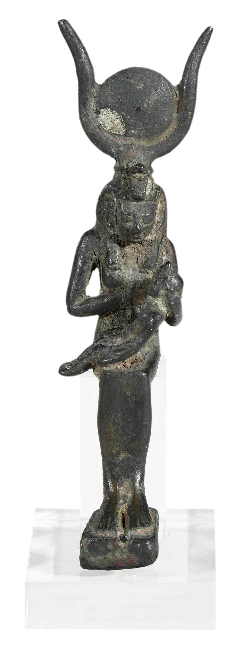 Egyptian Bronze Figure of Isis: possibly ancient, seated female holding child in lap, with lucite stand, figure 6-1/4 x 2 x 2-1/2 in. Provenance: Estate of Ben Smith, Newnan, Georgia
