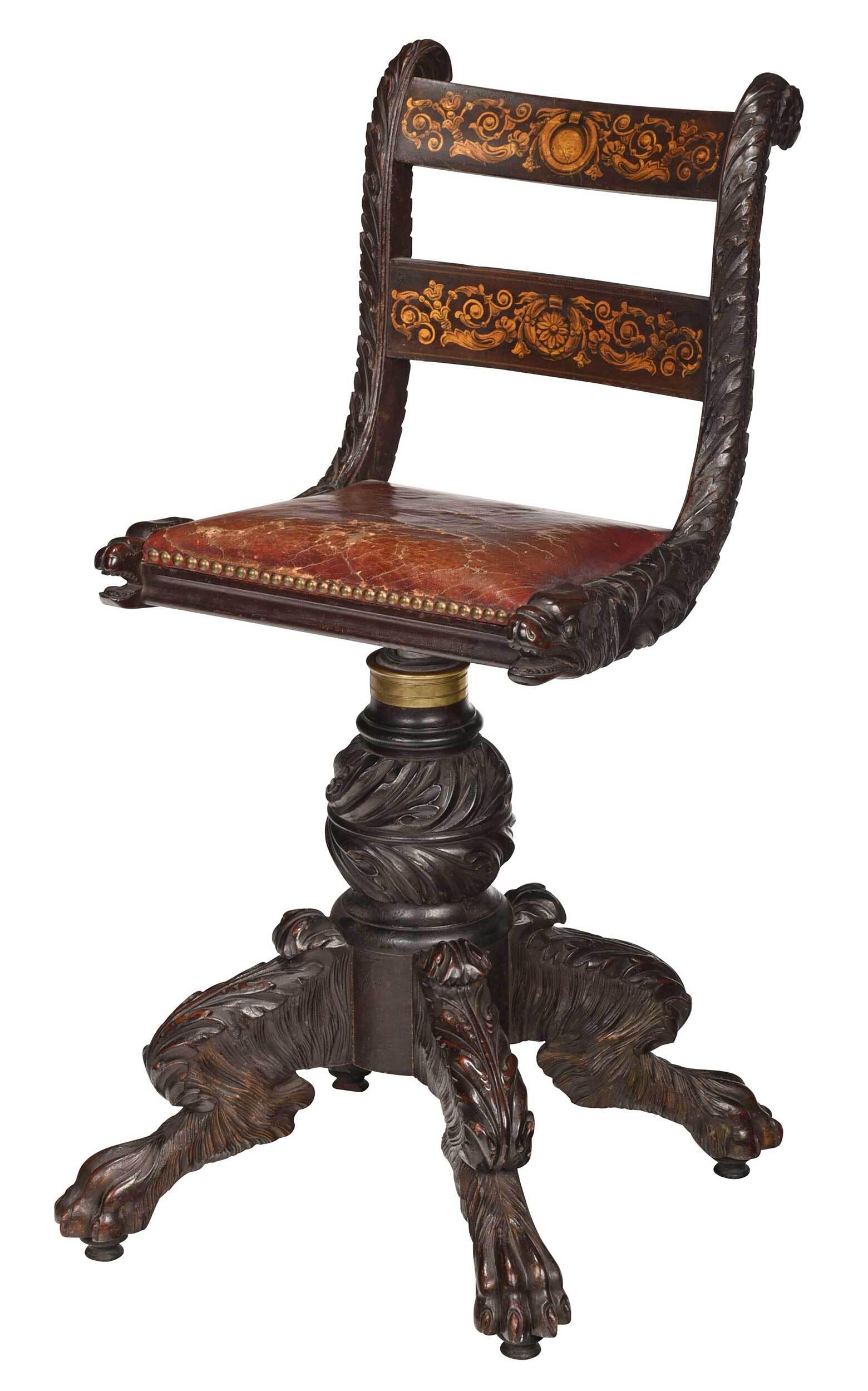 Rare American Classical Dolphin Figural Piano Stool: New York, 1825-1835, in a remarkable state of preservation, with stenciled back and stylized dolphin carved supports, original red leather set with brass tacking, swiveling on a leaf carved support wi