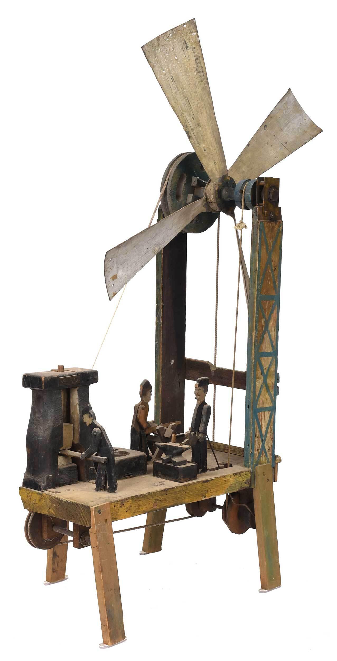 Folk Art Whirligig with Industrial Figures: American, 19th/20th century, polychrome wood, sheet metal, and rope construction, pulley operated turning mechanism, 46 x 34 x 15 in. Provenance: Private Collection, Morristown, Tennessee