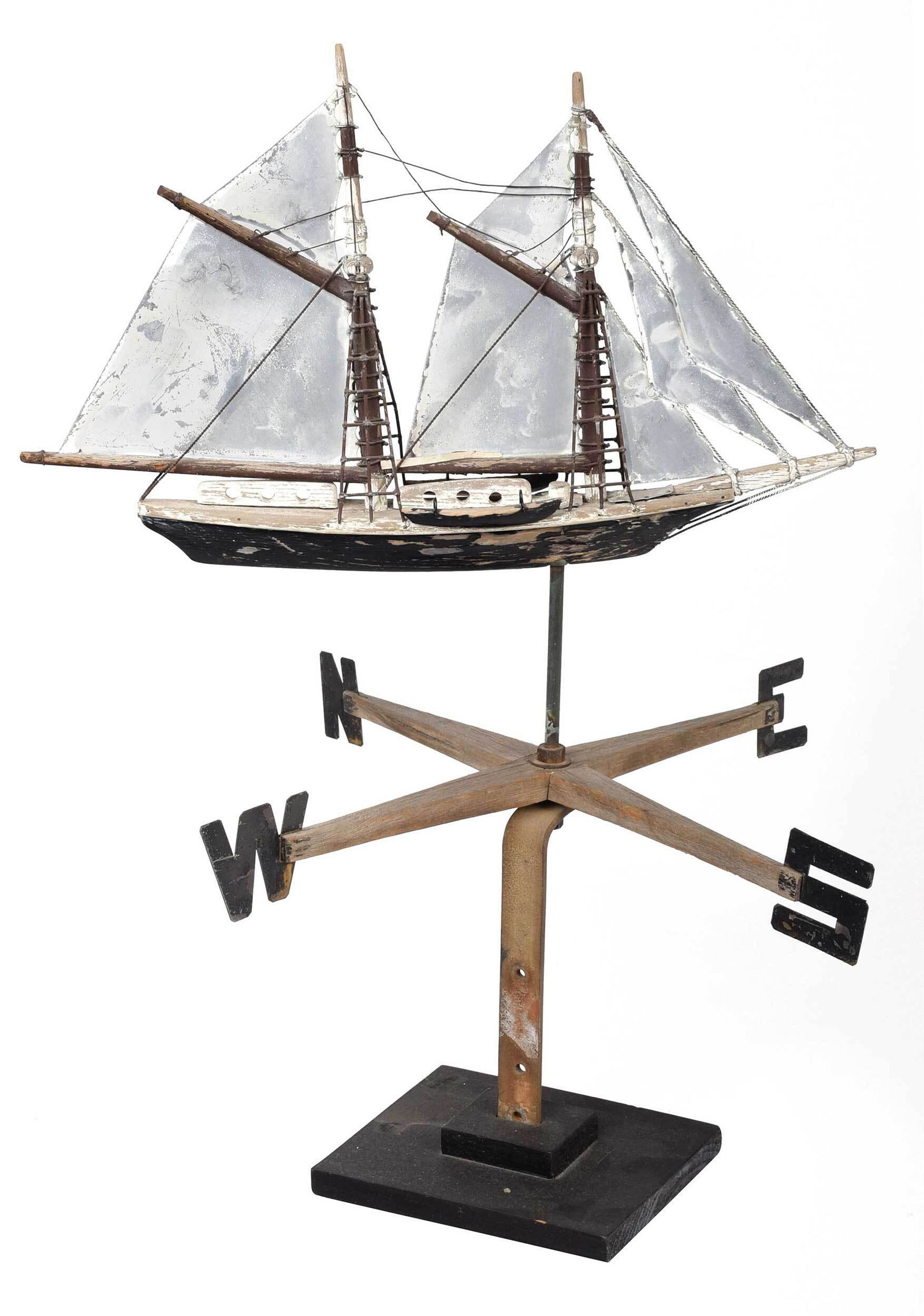 Frank Adams Folk Art Ship Weathervane Directional: (West Tisbury, 1873-1944) masted schooner weathervane in wood, tin, and paint, 20 x 22 in.; later painted two tiered base, 6-3/4 x 8-1/2 in. Provenance: Private Collection, Morristown, Tennessee