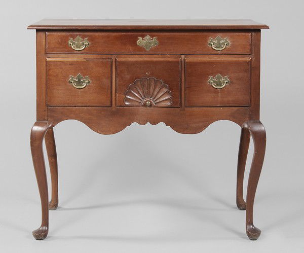 American Queen Anne Cherry Lowboy: Connecticut, 18th century, cherry with pine secondary, central carved fan drawer, shaped skirt, cabriole legs, 36 x 39-1/2 x 20 in., formerly base of high chest (top replaced), brasses replaced, refin