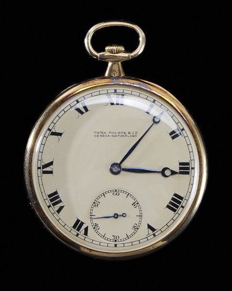 Patek Philippe Pocket Watch: 18 kt. yellow gold, open satin gold face, gold case marked "405212", 18-jewel works marked "193357", 1-3/4 in., not in working order, watch runs for short periods, stem and setting mechanism in workin