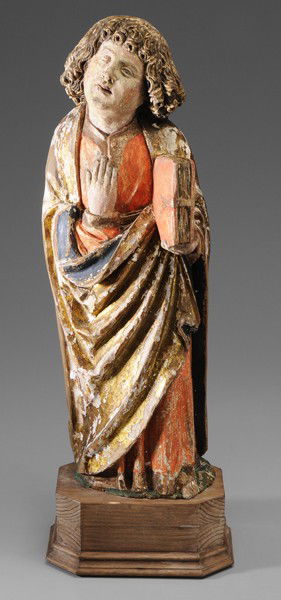 German School: 15th century, St. John the Evangelist, carved, gilt and polychromed wood, 20-1/4, 23-1/4 in. with newer stand, splitting, some areas with exposed linen, flaking, abrasions, minor pest damage Provenanc