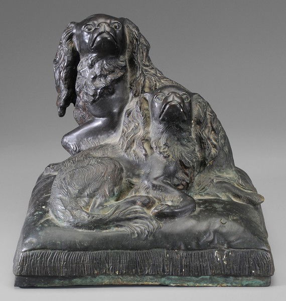 After Charles Valton: (French, 1851-1918), Two King Charles Spaniels on a Pillow, signed on base "C. Valton", patinated bronze, 17 x 18 x 15-3/4 in., corrosion, abrasions, accretion, grime Provenance: Estate of the Late Ba
