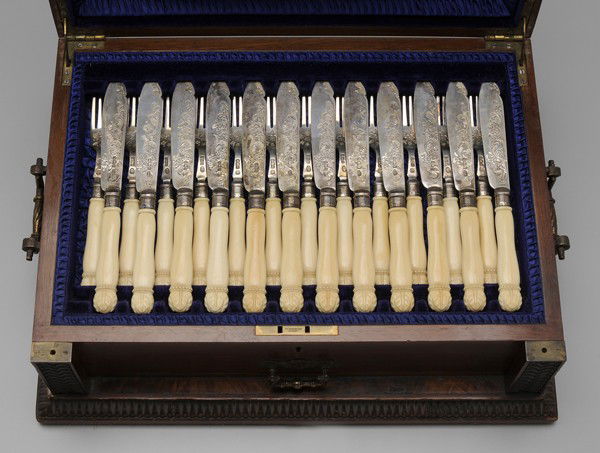 Cased English Silver, Ivory Fish and: Fruit Set, late 19th/early 20th century: carved ivory handles, engraved English silver blades and tines, some with marks for Sutherland & Roden (George Guirren Roden) dated 1899, Cooper Brothers dated