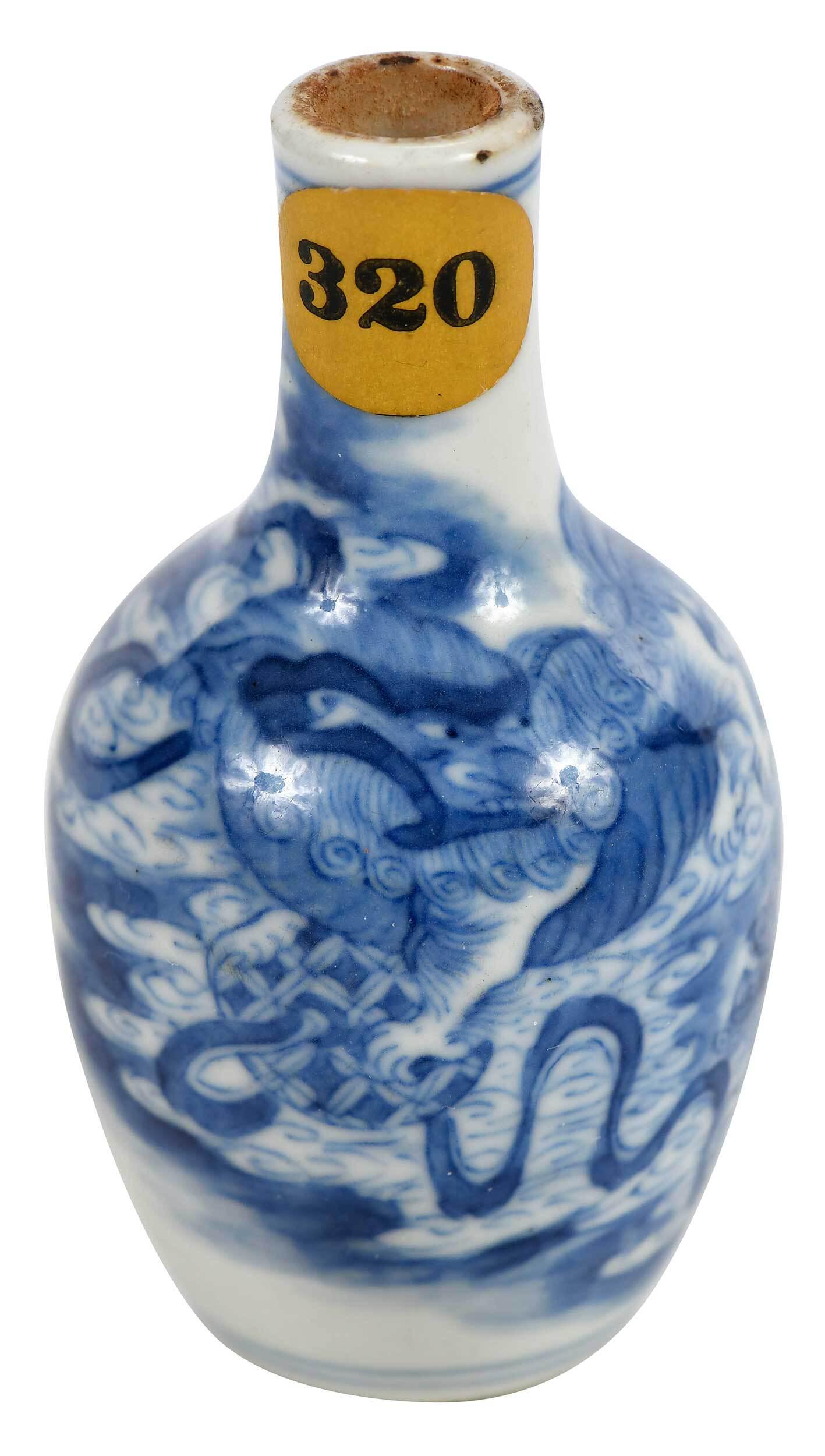 Chinese Blue and White Porcelain Miniature Vase: Qing dynasty, blue four character Yongzheng reign mark to base, bottle form with blue and white lion decoration, old sticker label with auction lot number, 3 in. Note: Wilhelmine Kirby Waller was the