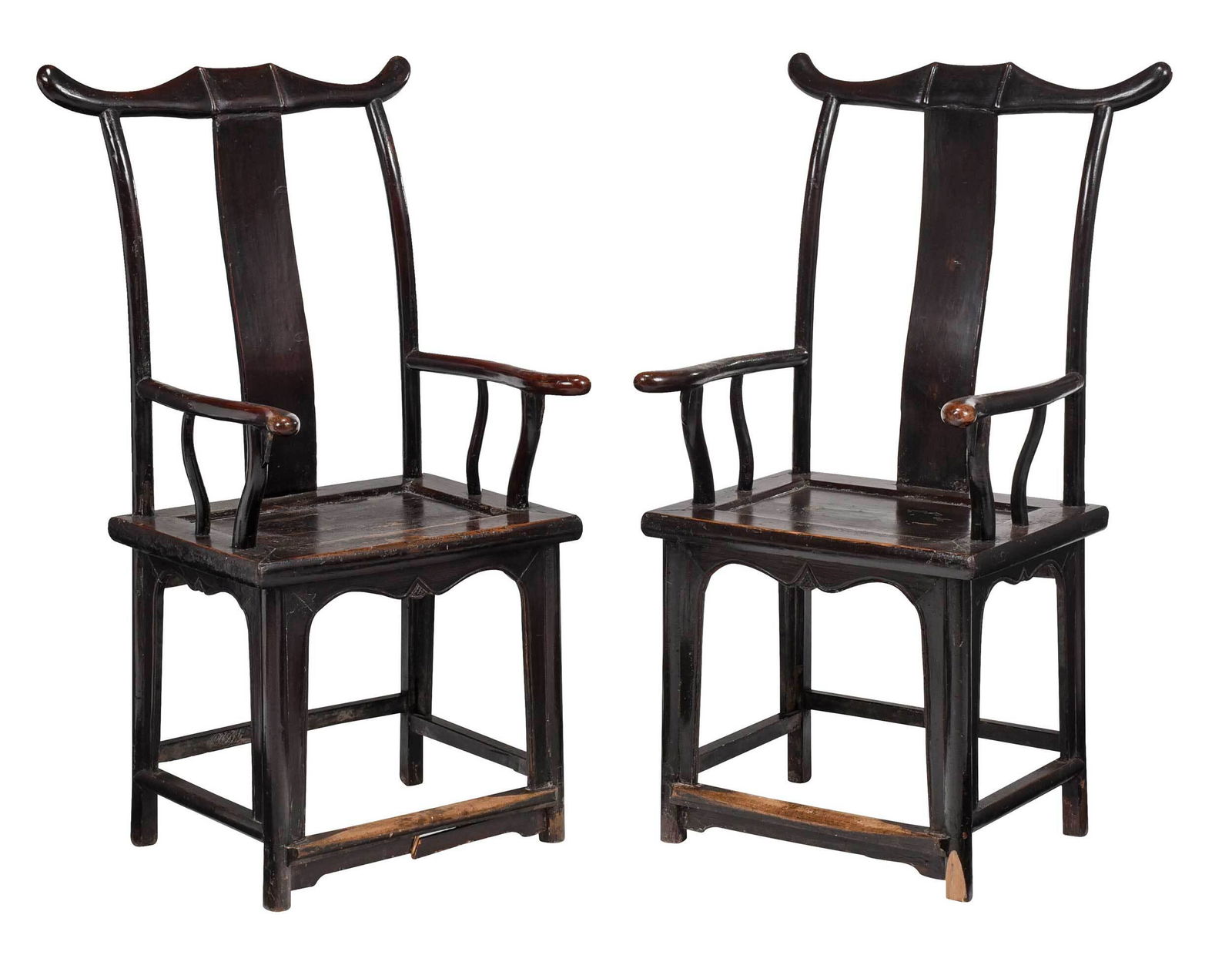 Pair Chinese Dark Red Lacquered Official's Chairs: Qing dynasty, original lacquered surface with paneled seats and carved skirt rails, 47-1/4 x 26 x 23 in. Provenance: Property of a lawyer who worked and resided in China