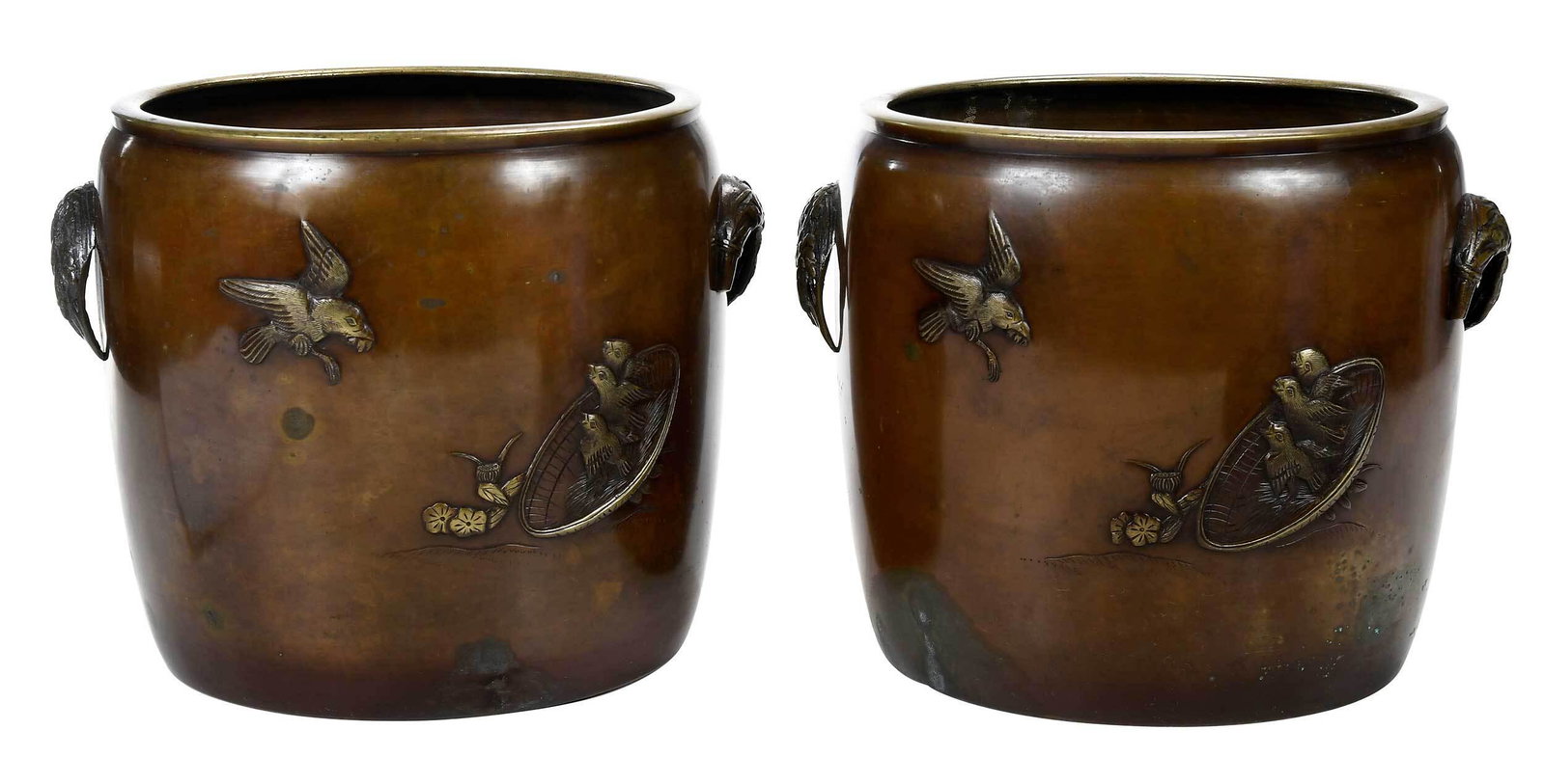 Pair of Japanese Mixed Metal Jardinieres: Meiji period, each of cylindrical form, decorated with birds and plants in relief, applied handles, 9-1/2 x 11 in. Note: With a Certificate of Antiquity from Honeychurch International Antiques Ltd. da
