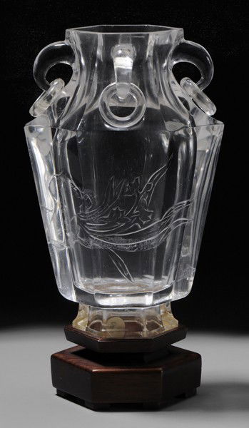 Fine Rock Crystal Vase: Chinese, tapered hexagonal form with four elephant trunk handles, each with loose rings, intaglio decoration with flowers, attached to conforming wooden base, 6-7/8 in., two rings with repaired breaks