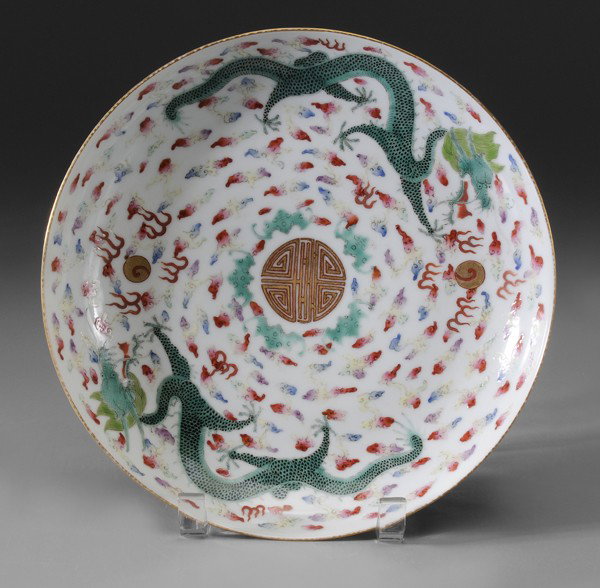 Chinese Porcelain Plate: Qing dynasty, six-character Tongzhi reign mark, center [shou] (longevity) mark encircled by five bats, polychrome enamel dragons reaching for flaming pearls, reverse with three floral motifs, 1-5/8 x 