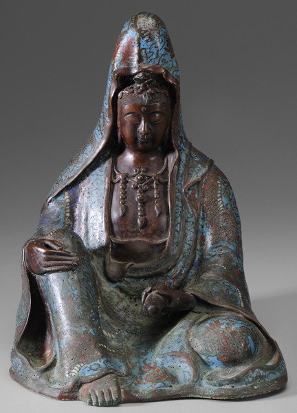 Champlevé Figure of Guanyin: Chinese, 19th century, figure holds a sutra in her left hand, 13-1/4 x 10 in., wear and corrosion, enamel losses, old labels Provenance: Estate of the Late Barbara Riley, Savannah, Georgia