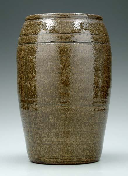 Lanier Meaders jar,: mottled medium olive alkaline glaze, two incised lines at shoulder, incised on bottom "Lanier Meaders", 13-1/2 x 8-3/4 in. 5 in. crack at foot. Provenance: Kopf Collection.
