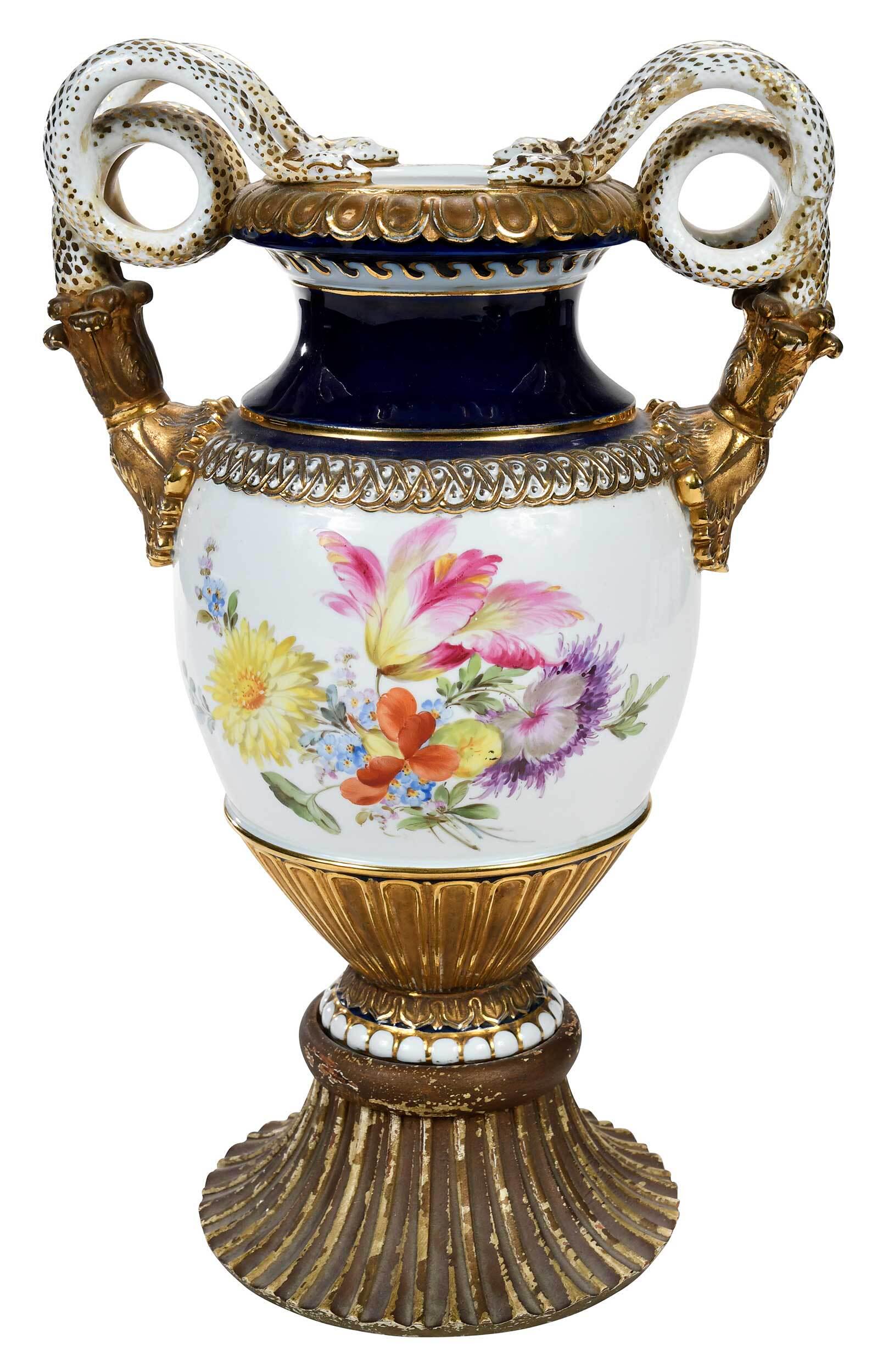 Meissen Porcelain Vase with Snake Form Handles: of baluster form, with hand painted foliate sprays to each side, scrolling double snake handles with gilt painted highlights, raised on giltwood flared ribbed circular foot, 15-1/4 in. Provenance: Joh