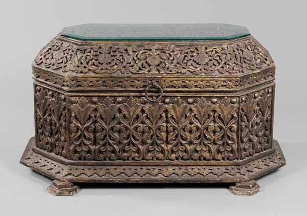 Carved and Paint-Decorated Lift-Top: Coffer Far Eastern, possibly Balinese, 19th century, elaborately carved overall, hinged lid with open interior, surface with gold-painted decoration, top fitted with beveled glass, 26 x 49-1/4 x 32 in