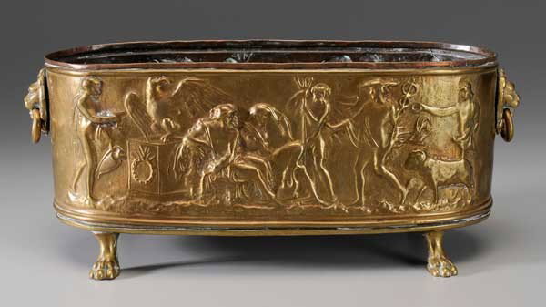 Classical Style Brass Planter: early-20th century, classical figures in relief, lion's head ring handles, cast paw feet, 6-3/4 x 16-1/4 in., several minor splits, rim with slight break Provenance: Private Collection, Memphis, Tenne