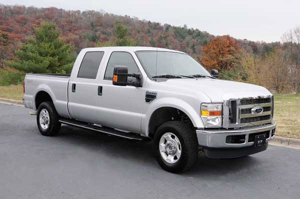 2010 Ford F250 Super Duty Crew Cab: Pickup Truck four-wheel drive, 5.4 L V-8 engine, trailer hitch, brake and towing package five-speed automatic transmission, air conditioning, CD player, fully equipped, 6,900 original miles, original 