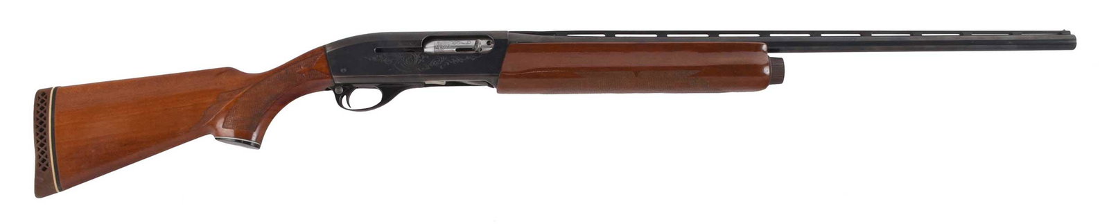 Remington Model 1100 Semi Auto Shotgun: 20 gauge, SN L985210x, 25 in. barrel, vented barrel rib, bead front sight, "REMINGTON ARMS CO. INC., ILLION, N.Y., MADE IN U.S.A." stamped on right side, 2-3/4 in. shells or shorter, engraved flourish