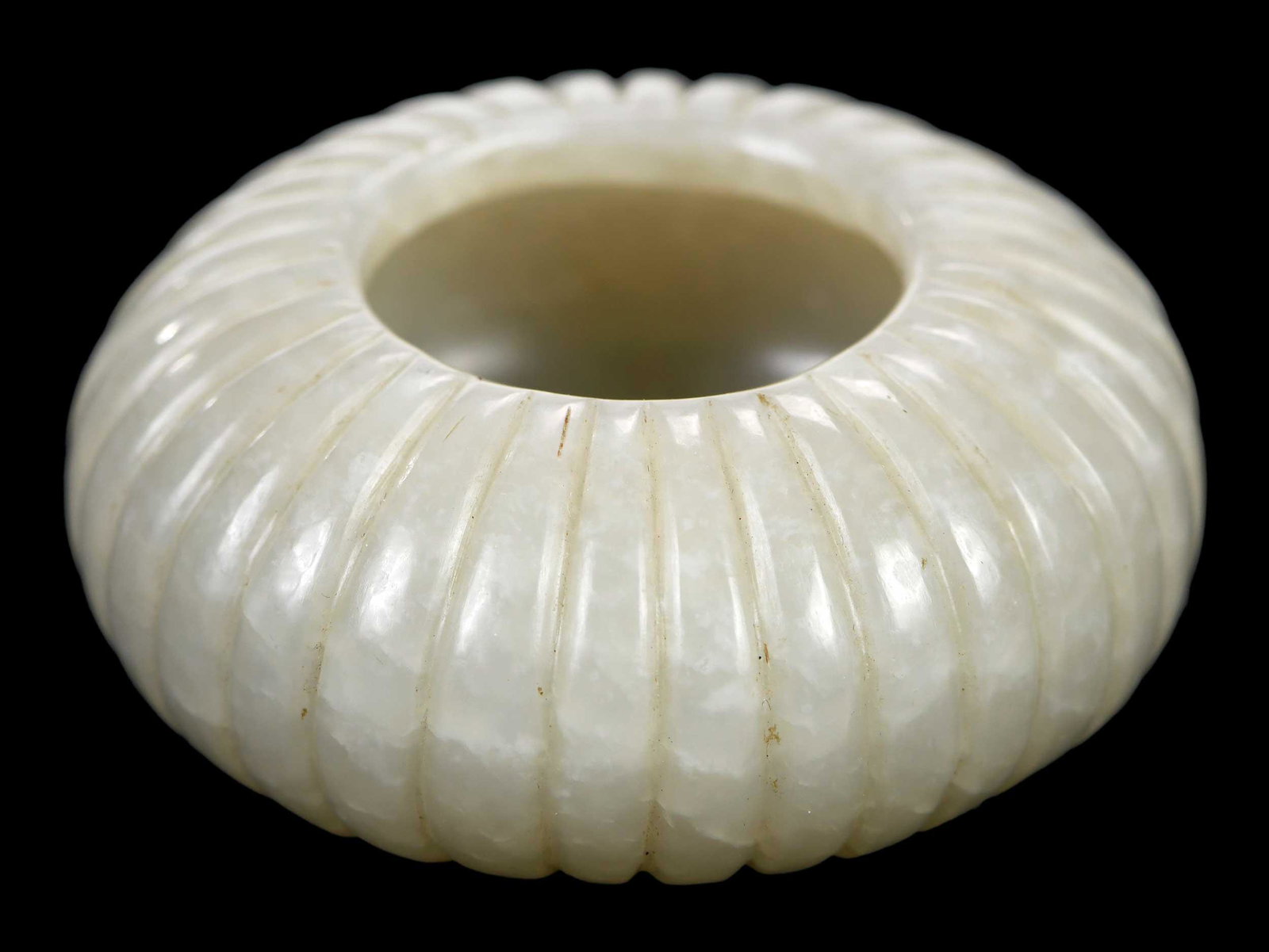 Chinese Carved Jade Miniature Brush Washer: pale green with whitish inclusions, of squat, lobed form, 1 x 2-1/8 in.